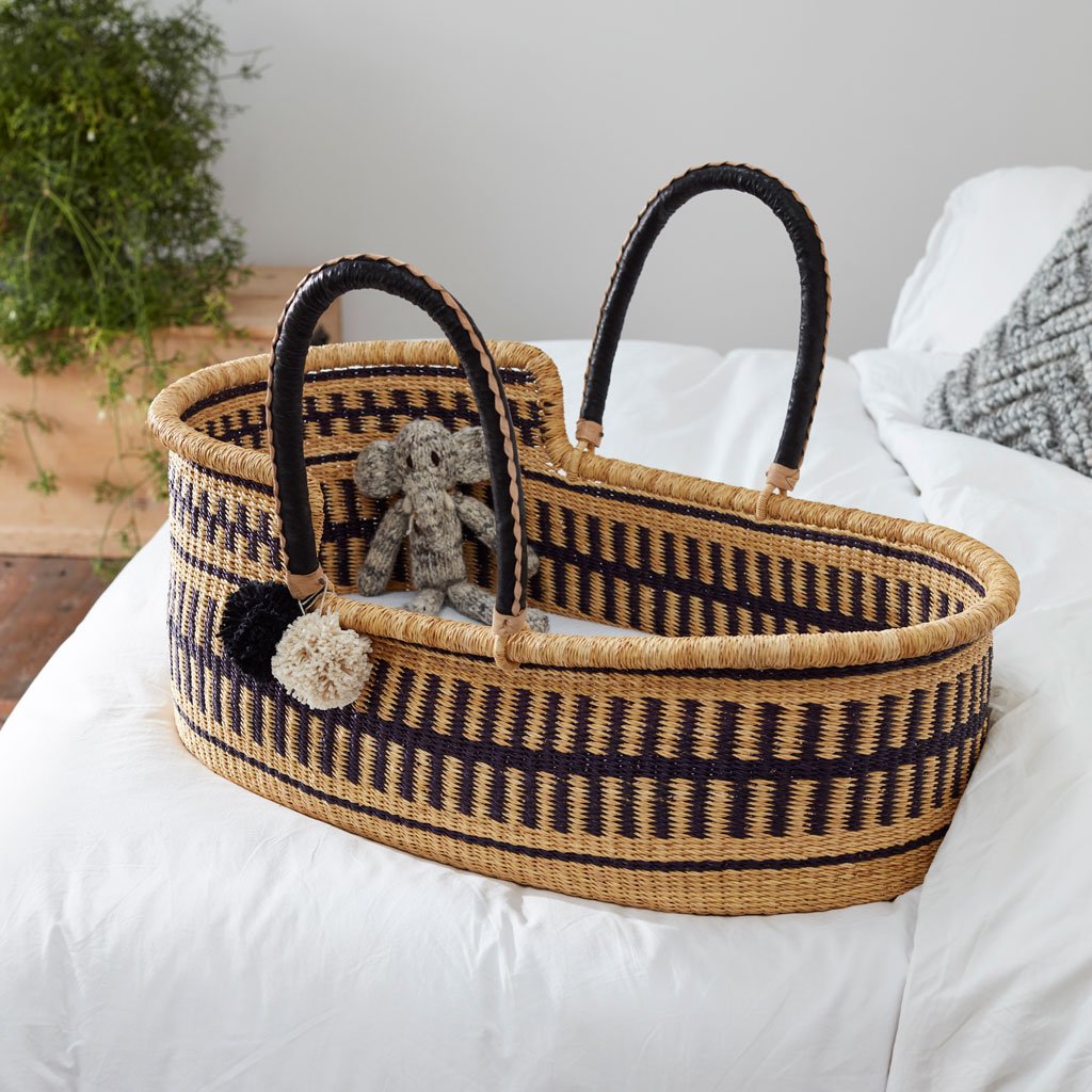 Jojo Mono natural woven moses basket black and cram leather handles handles baby beds by the little rattan company