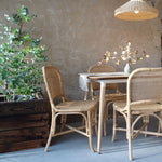Danica natural rattan dining chair dining chairs by the rattan company