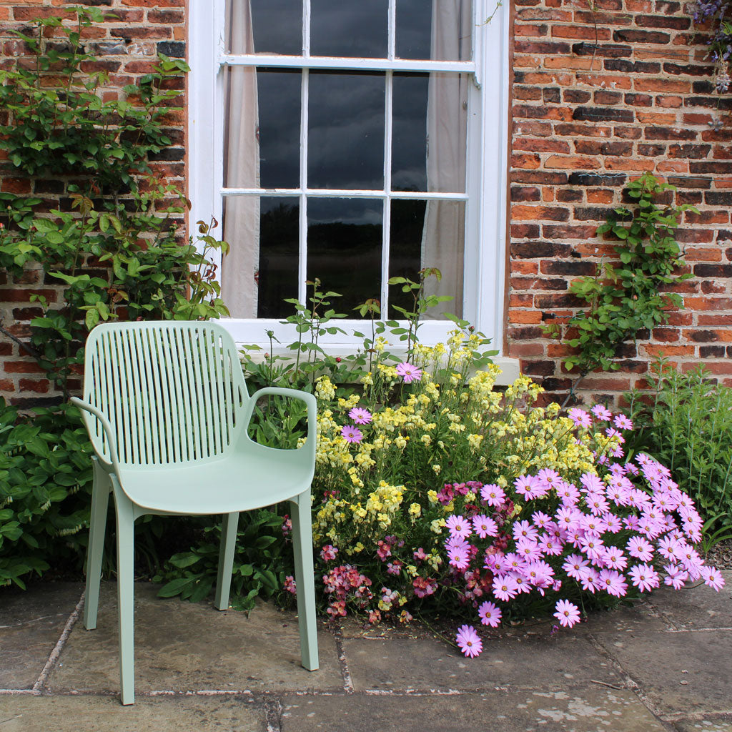 Green plastic deals dining chairs