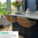 Kitchen island with wicker Java bar stools from the Rattan Company 