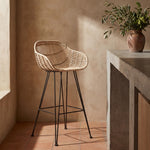 Java Rattan Bar Stool at a Concrete Kitchen Counter