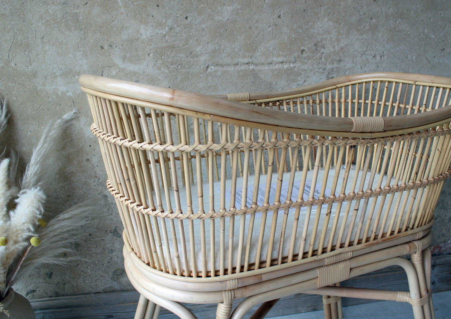 Rattan baby crib, eco-friendly baby bed, handwoven baby crib, breathable baby bassinet, boho baby crib, safe newborn crib, modern nursery crib