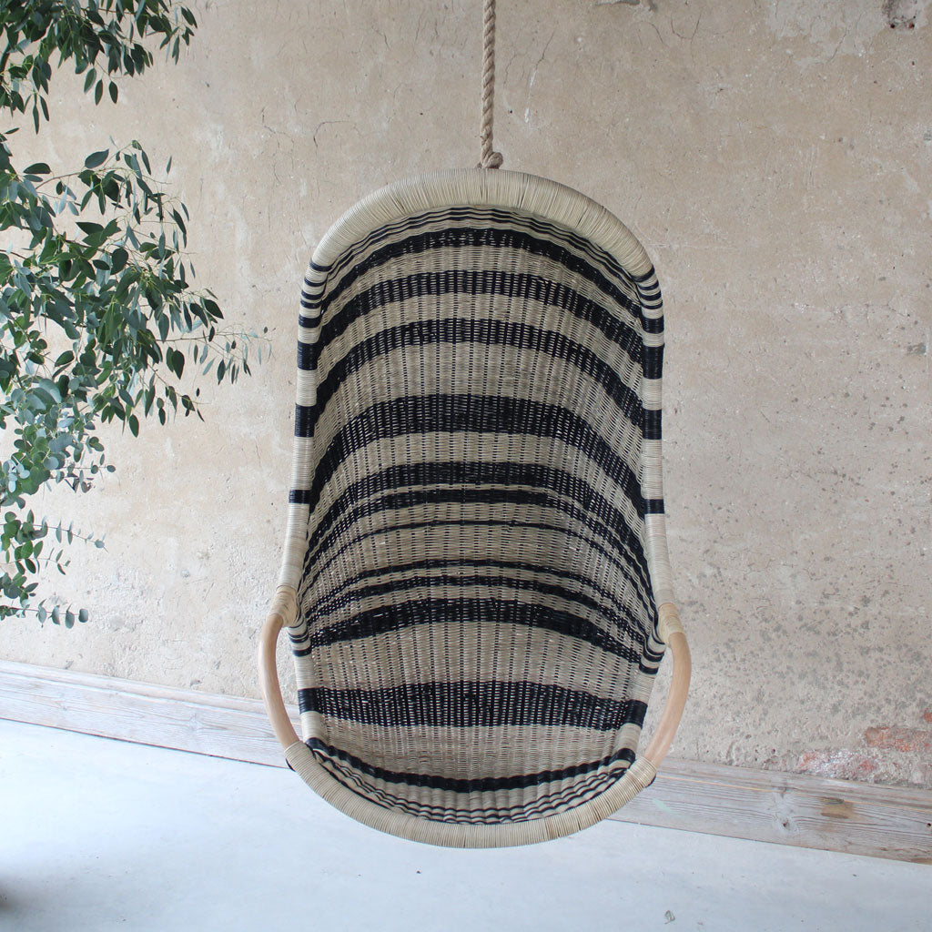 Zebedee rattan hanging egg chair, black and natural indoor hanging chair by the rattan company