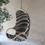 Zebedee rattan hanging egg chair, black and natural indoor hanging chair by the rattan company