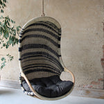 Zebedee rattan hanging egg chair, black and natural indoor hanging chair by the rattan company